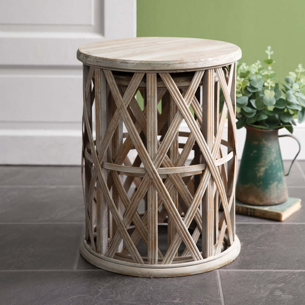 Boho basket weave accent table showcasing crisscross patterns and rustic charm, perfect for adding texture to any room.