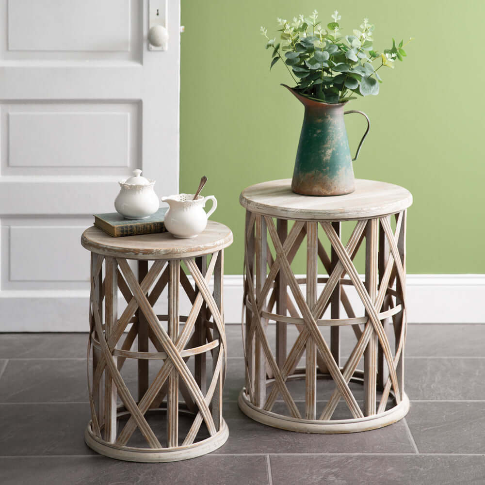 Boho basket weave accent tables set of 2 with floral arrangement, enhancing rustic charm and bohemian style in a room.