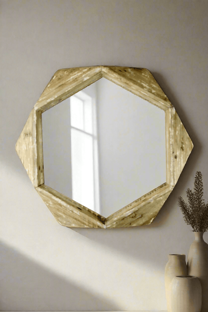 Rustic hexagonal wood wall mirror with distressed frame, adding charm to modern farmhouse decor.