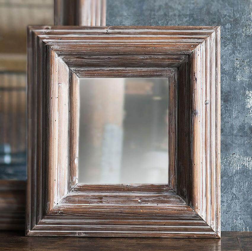 Rustic whitewashed square wood mirror with detailed frame, perfect for enhancing home decor charm and elegance.