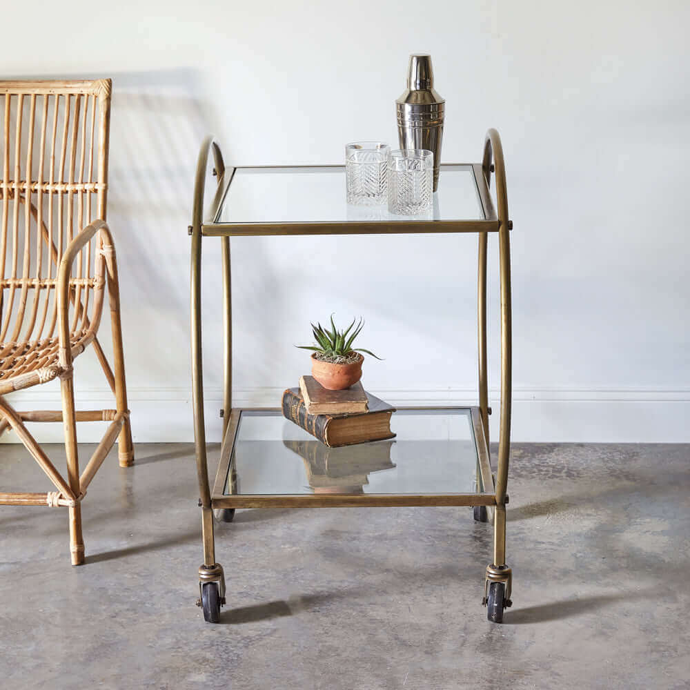 Antique Inspired Brass Finished Bar Cart with Glass Shelves