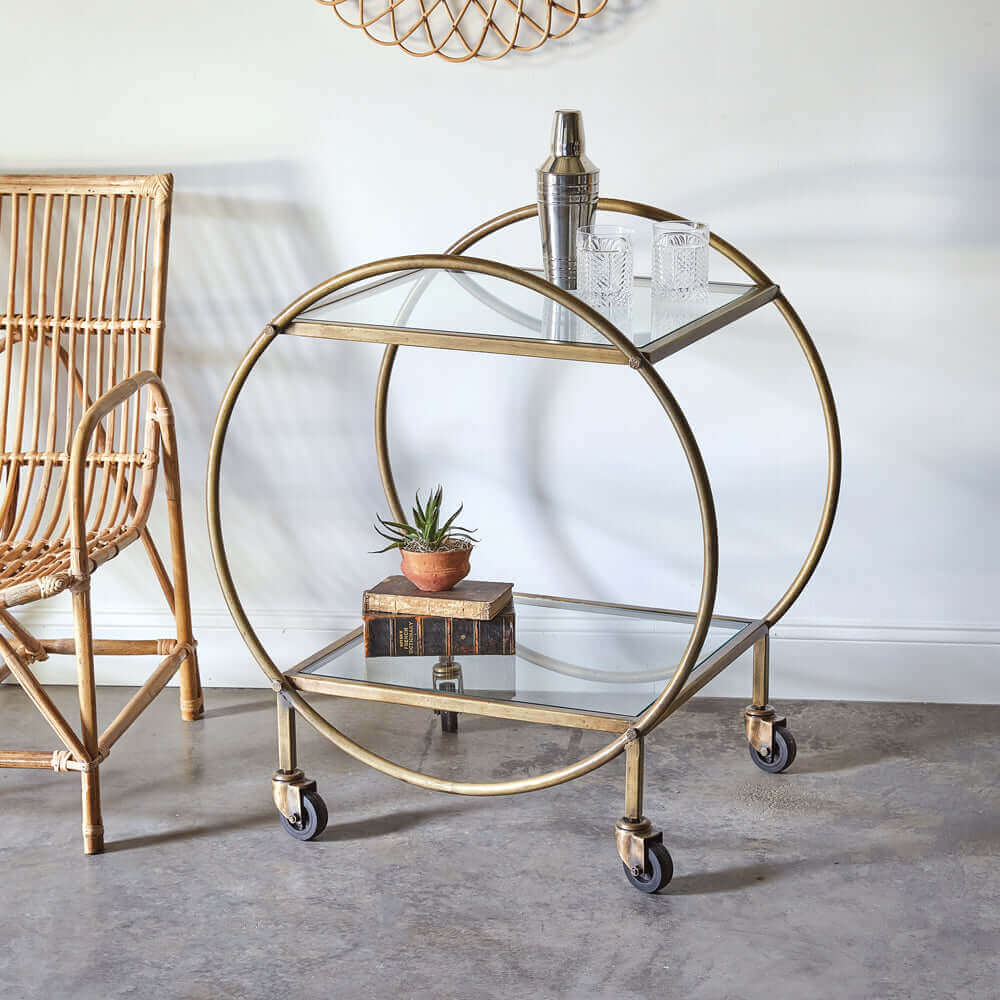 Antique Inspired Brass Finished Bar Cart with Glass Shelves